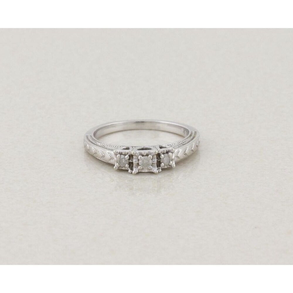 10k White Gold 1/8th Carat Three Stone Diamond Ring Size 7